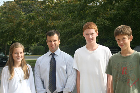 Mr. Herr with the students who beat him: Steffi, Greg and Jimmy