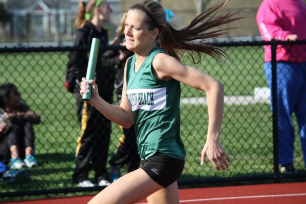 Steffi running a leg of the 4x400M relay