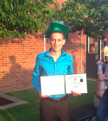 Juan at graduation on June 21, 2013