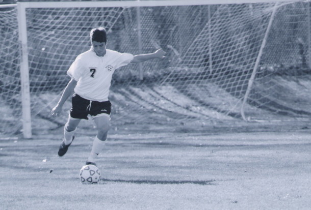 Mr. Hoyt playing soccer in high school