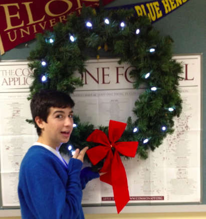 Youth to Youth member, Alex Patricolo, with a wreath. 