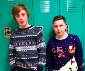 Ryan Duncan and Michael Gattuso wearing their holiday sweaters 
