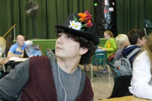 Chris Zito poses, clothed in floral attire for no specific reason, during his lunch period in the school cafeteria.