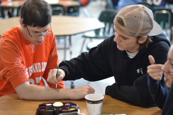 Senior Devon Conti volunteering his time last Saturday at the Special Olympics