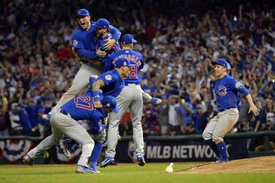 CLEVELAND, OH - NOVEMBER 2:  Members of the Chicago Cubs celebrate defeating the Cleveland Indians in Game 7 of the 2016 World Series at Progressive Field on Wednesday, November 2, 2016 in Cleveland, Ohio. (Photo by Ron Vesely/MLB Photos via Getty Images)