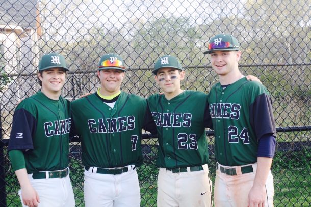 WHB Alum Nick Einstman and Nick Arpino stand with now-seniors Ben Osborne and Jake Viera in their final varsity game.