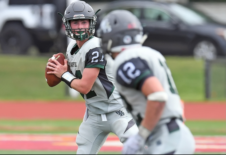 QB Clarke Lewis looks to pass to Dylan Laube