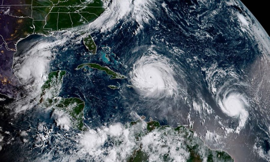 This satellite image obtained from the National Oceanic and Atmospheric Administration (NOAA) shows (L-R) Category 1, Hurricane Katia; Category 5, Hurricane Irma and, Category 1, Hurricane Jose at 1300UTC on September 7, 2017.  / AFP PHOTO  /Getty Images