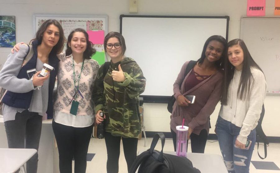 Ms. Galante (second from left) with her French III students.