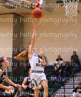 Molly McCarthy going up for a layup against Bayport-Blue Point