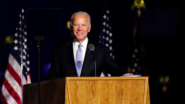 Biden pictured at his victory speech on Saturday night