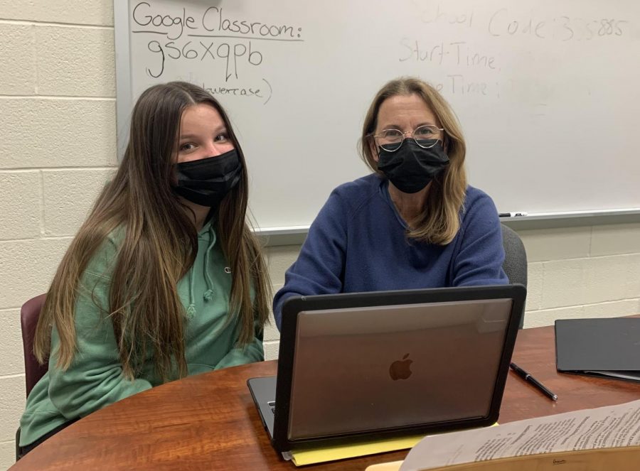 Mrs. Wiles, AP seminar teacher in the writing studio with sophomore, Bella Pellegrinelli. 