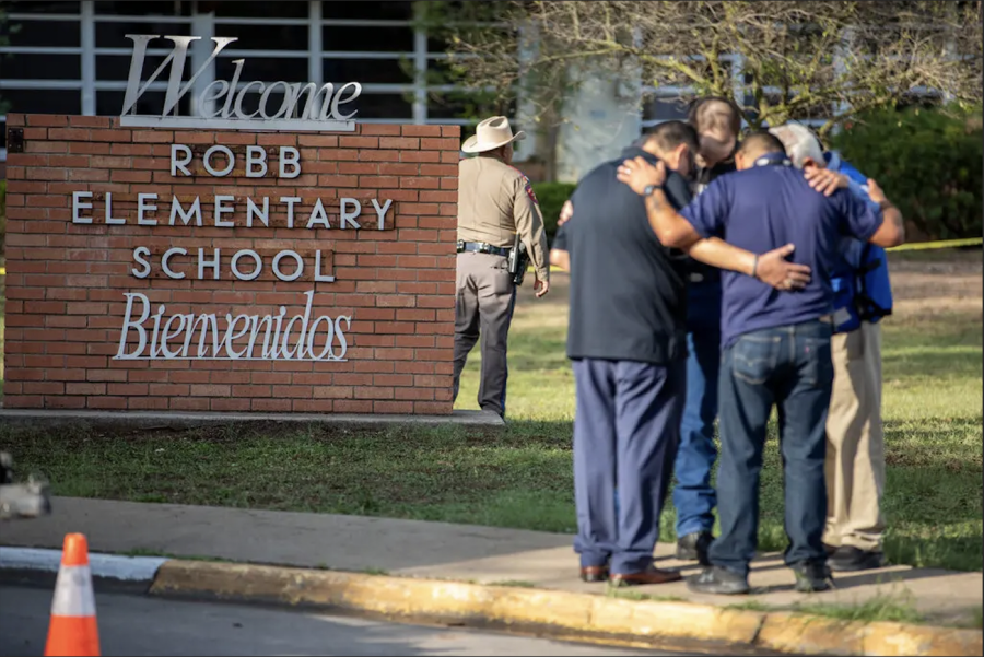 photo+courtesy%3A+nytimes.com%0APeople+praying+outside+of+Robb+Elementary+School+in+Uvalde%2C+Texas.