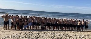 The Football team after finishing the Rogers Beach Challenge