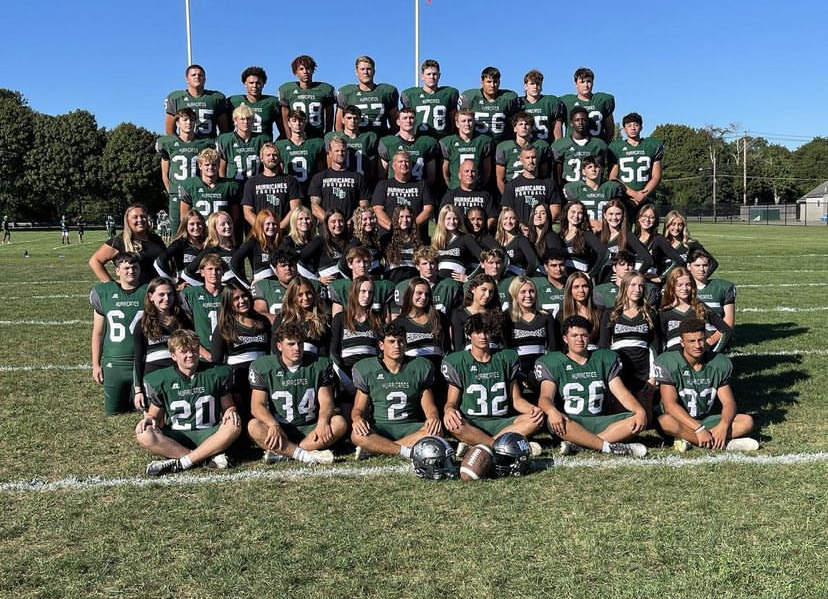 Football and cheer team. Photo courtesy @westhamptonbeachvarsitycheer on Instagram.