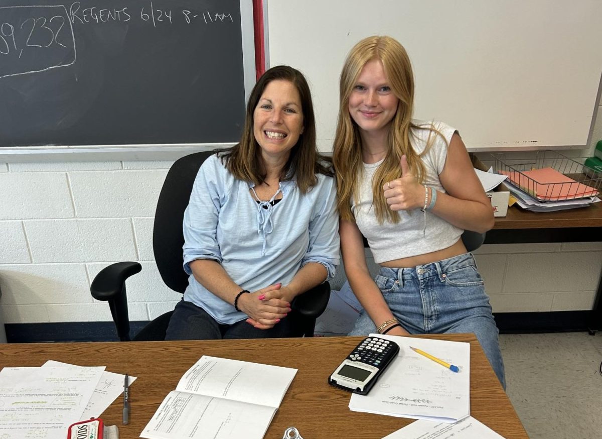 Mrs. Mecca with student Tessa.