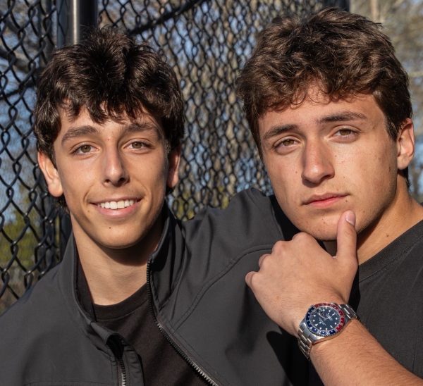 Announcers Travis and Nico posing in the booth before a game.